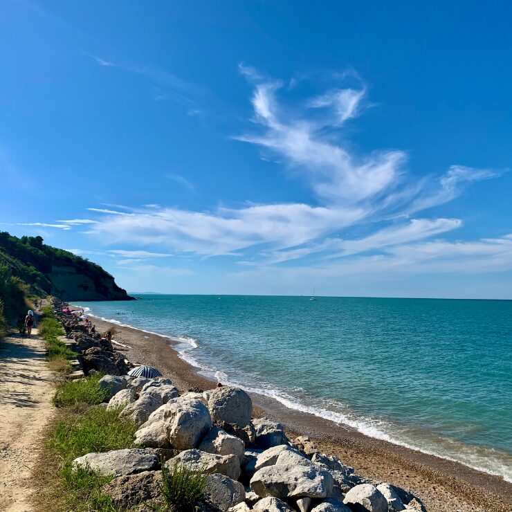 Punta Ferruccio beach Ortona Abruzzo Italy with crystal clear Adriatic water and green cliffs