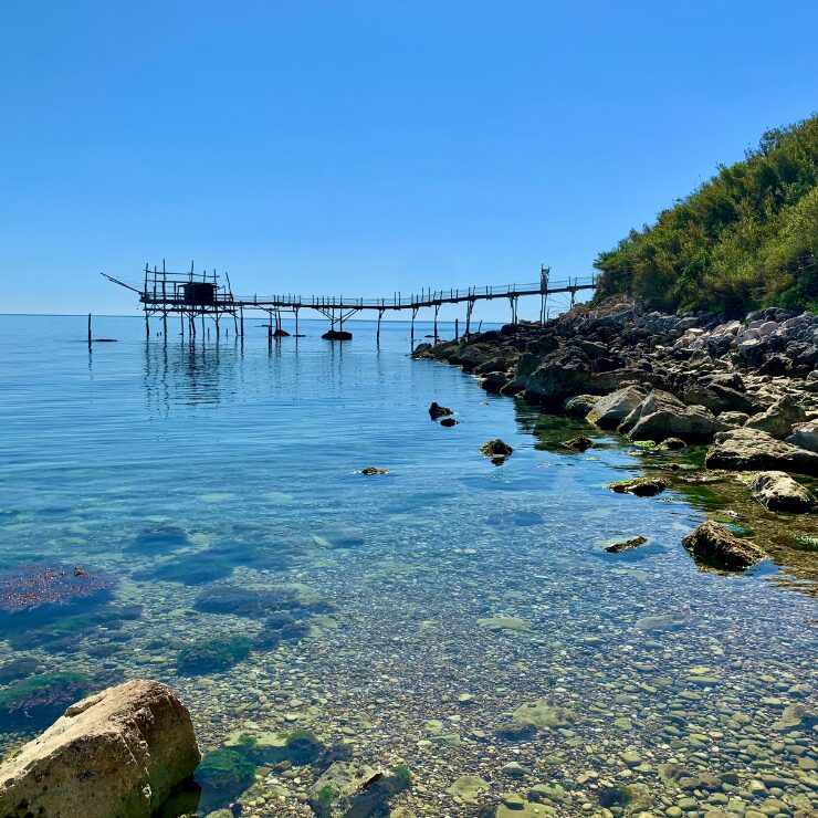 Trabocco at Calata Turchino beach Costa dei Trabocchi Abruzzo Italy with crystal clear water